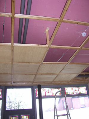 First ceiling tiles in place